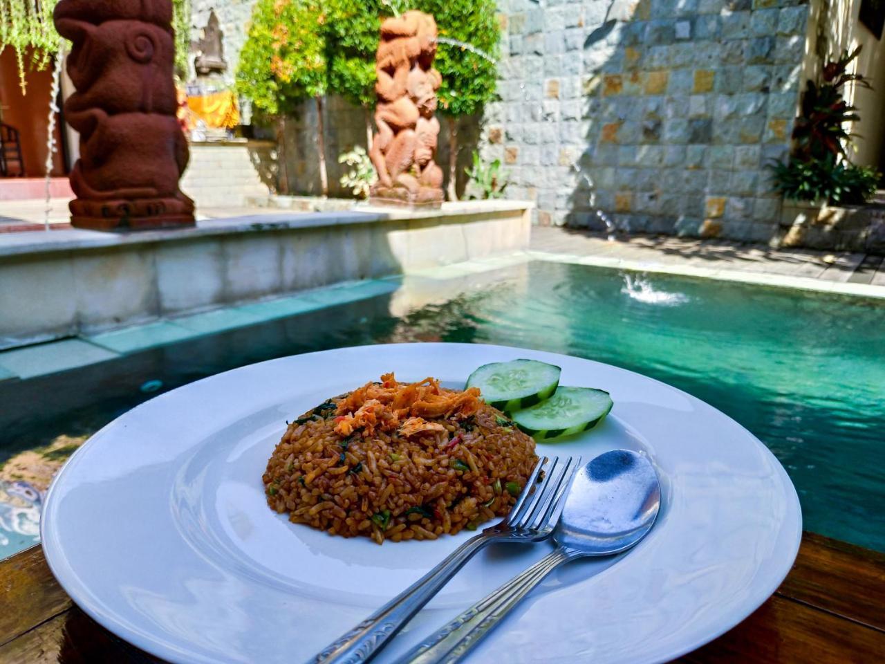 Catur Adi Putra Hotel Denpasar Extérieur photo